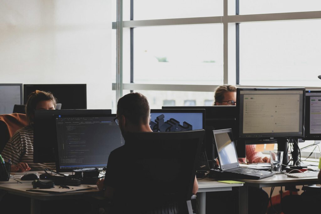 People working in on computers in an office setting