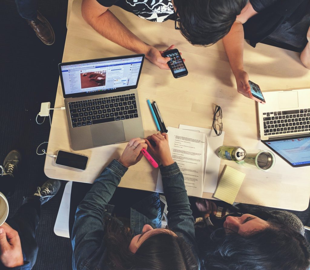 People working together around a table.