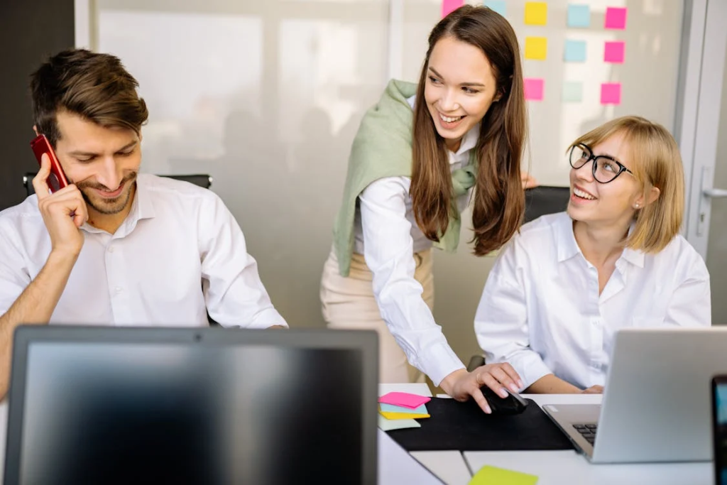 group of people working and smiling