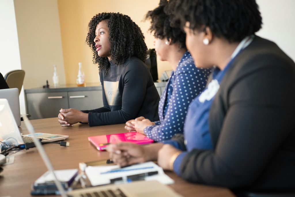 women at a table during a discussion