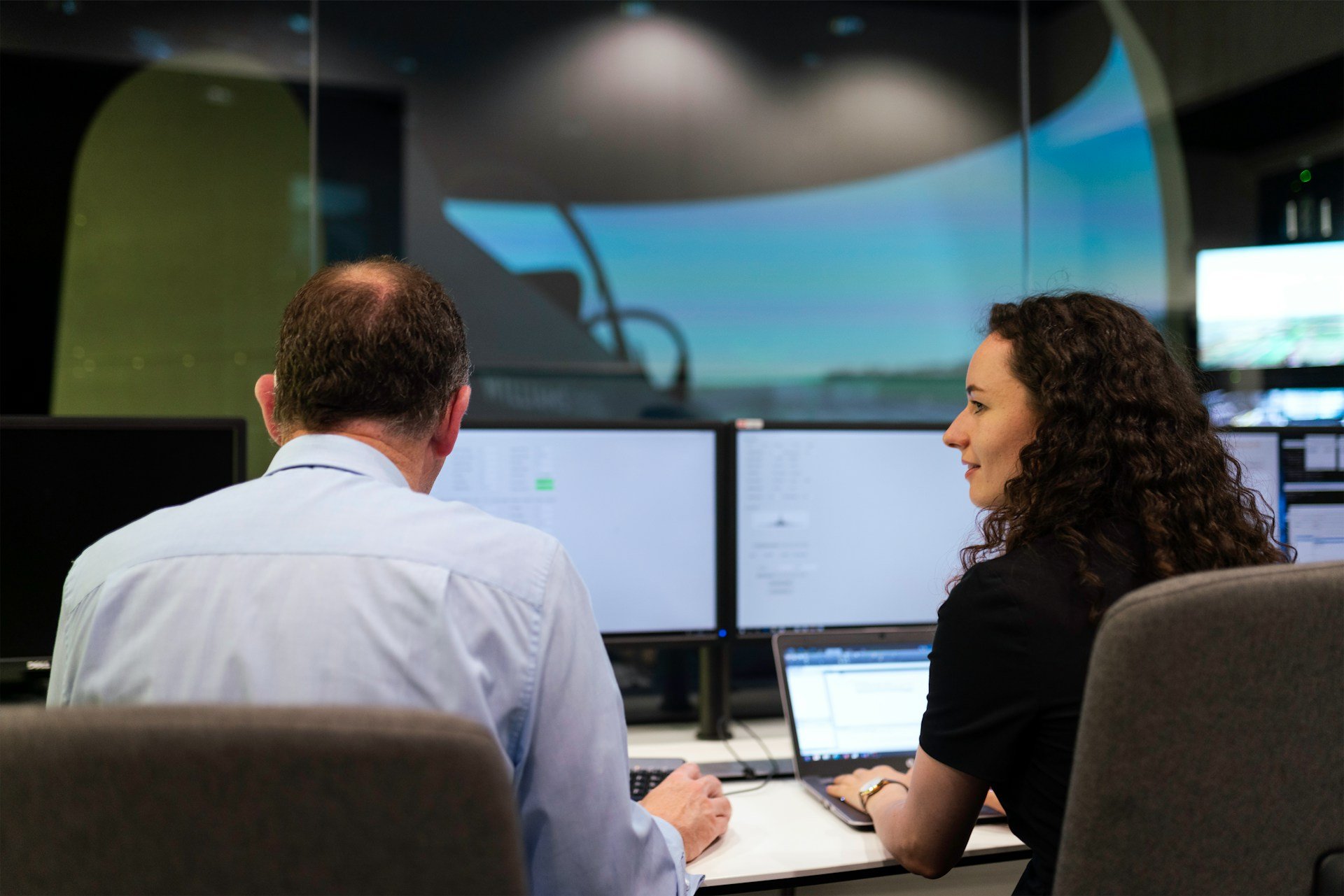 Two people working together in an office